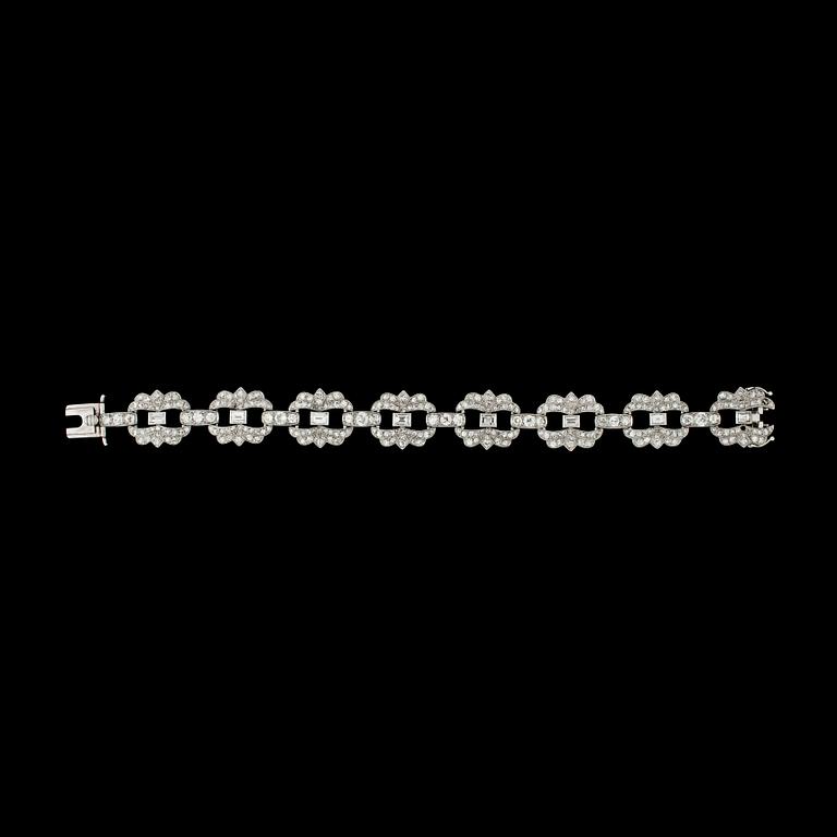 ARMBAND, gammal- smarad- och åttkantslipade diamanter, tot. ca 9 ct. 1930-tal.