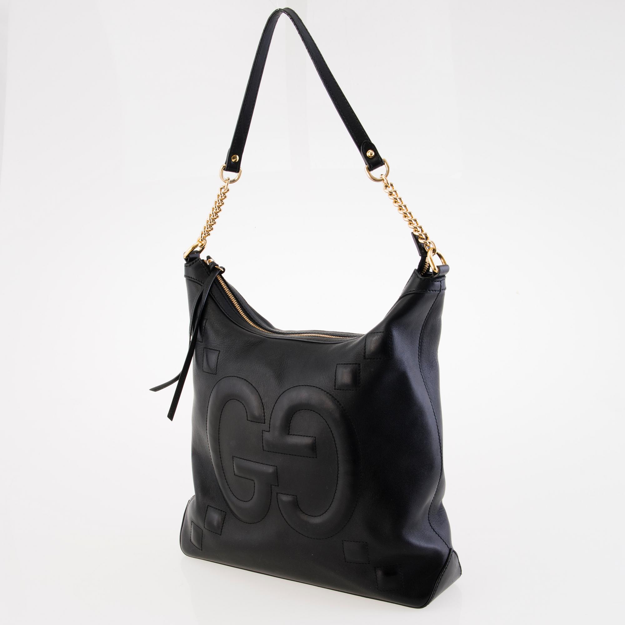 GUCCI Apollo Embossed GG Black Leather Shoulder Bag.