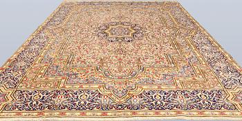 A Kirman Laver carpet, 'Millefleur', approx. 410 x 296 cm.