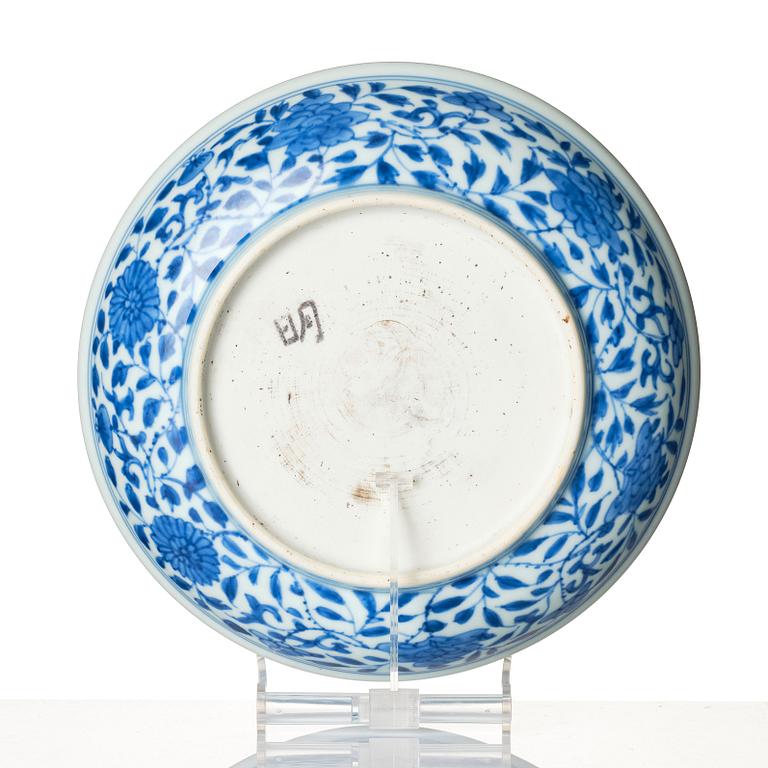 A blue and white 'lotus bouquet' dish, Qing dynasty, 18th century.