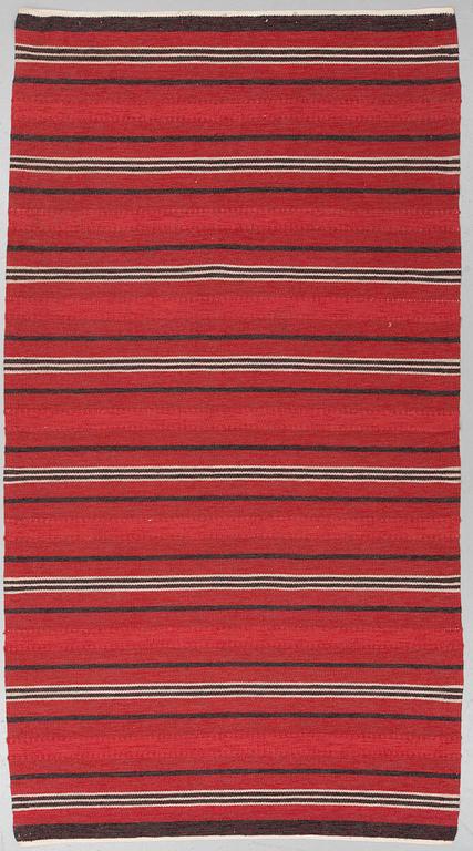 A CARPET, flat weave, around 285 x 151 cm.