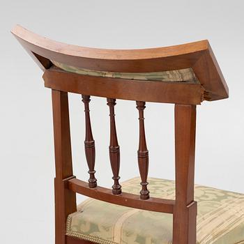 A sofa, two armchairs, four chairs and table, Empire style, 20th century.