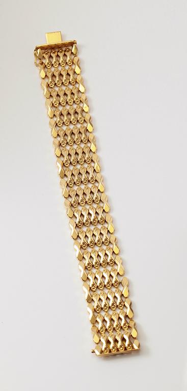 ARMBAND, 18K guld. Vikt ca 44 g.
