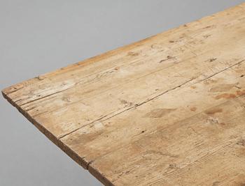 A pine trestle table, 20th century incorporating older elements.
