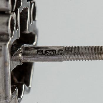 A pair of 18K white gold earrings set with baguette-cut and brilliant-cut diamonds.