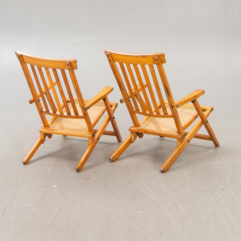 A pair of early 1900s deck chairs.