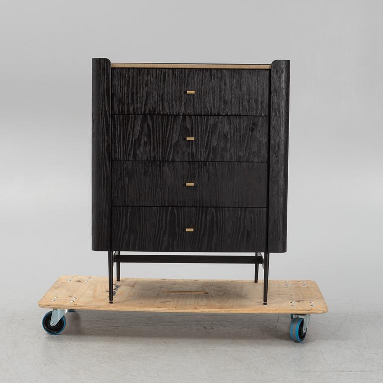 A black stained oak veneered 'Milano' dresser with top covering of faux stingray skin.