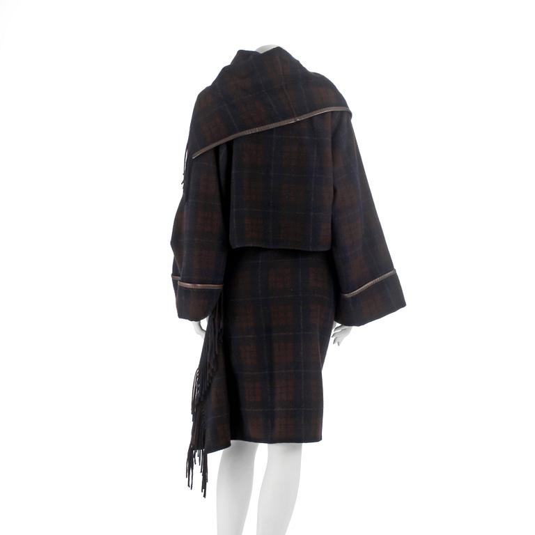HERMÈS, a blue and brown chequered cashmere dress consisting of jacket and skirt. Size 40.