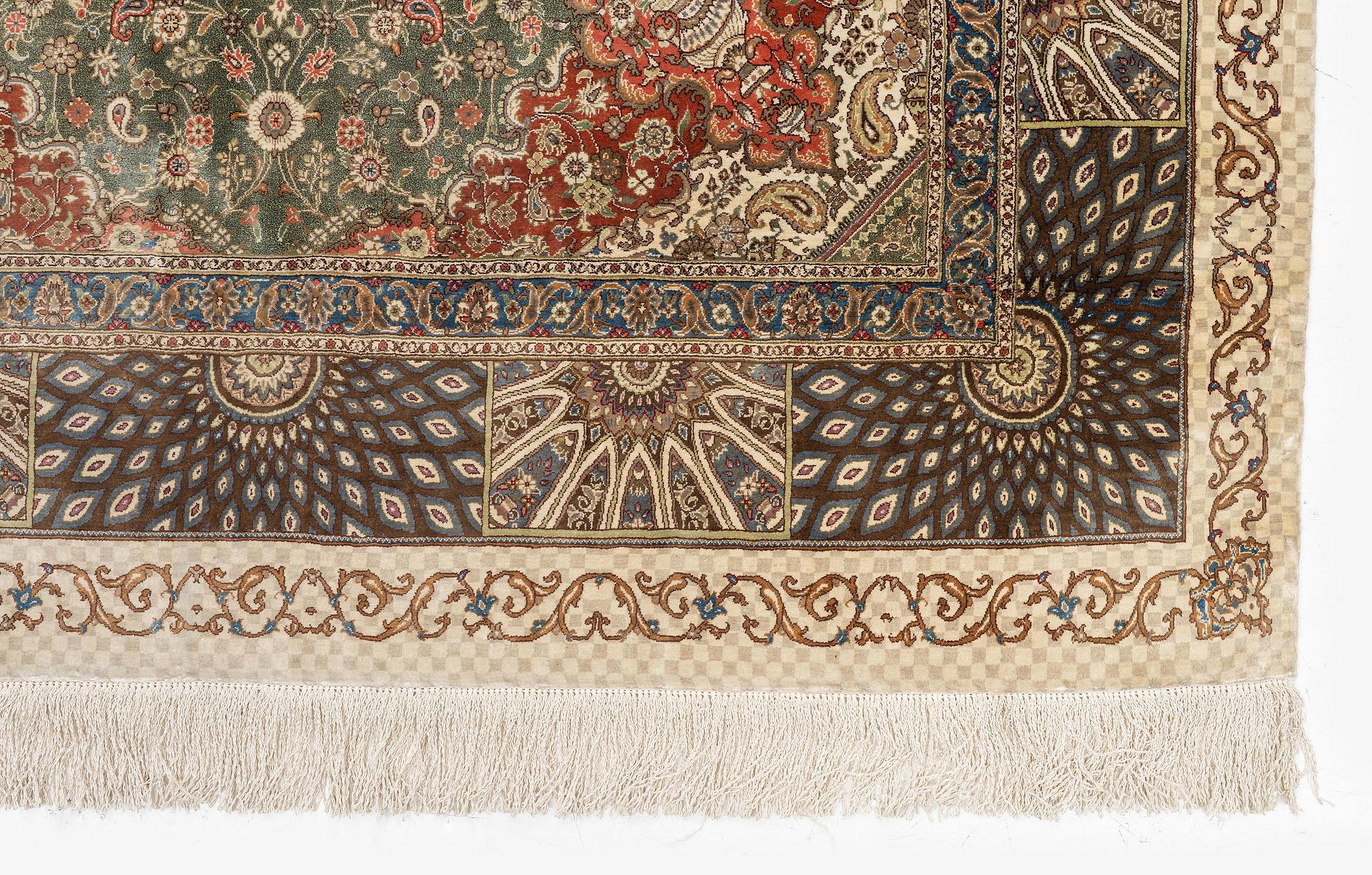 A silk Qum, Central Persia. signed Mohammad Gamshidi, c. 203 x 126 cm.