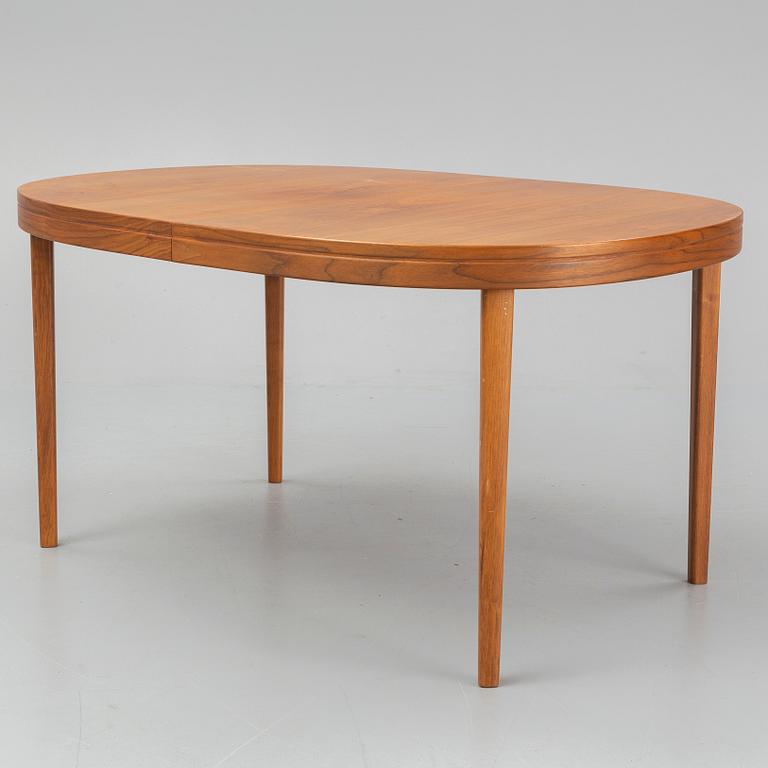 A walnut veneer table from the second half of the 20th century.