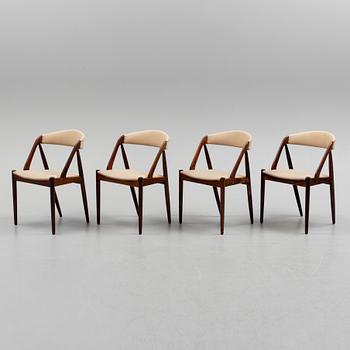 KAI KRISTIANSEN, four rosewood 'Pige' chairs from Denmark, 1960's.