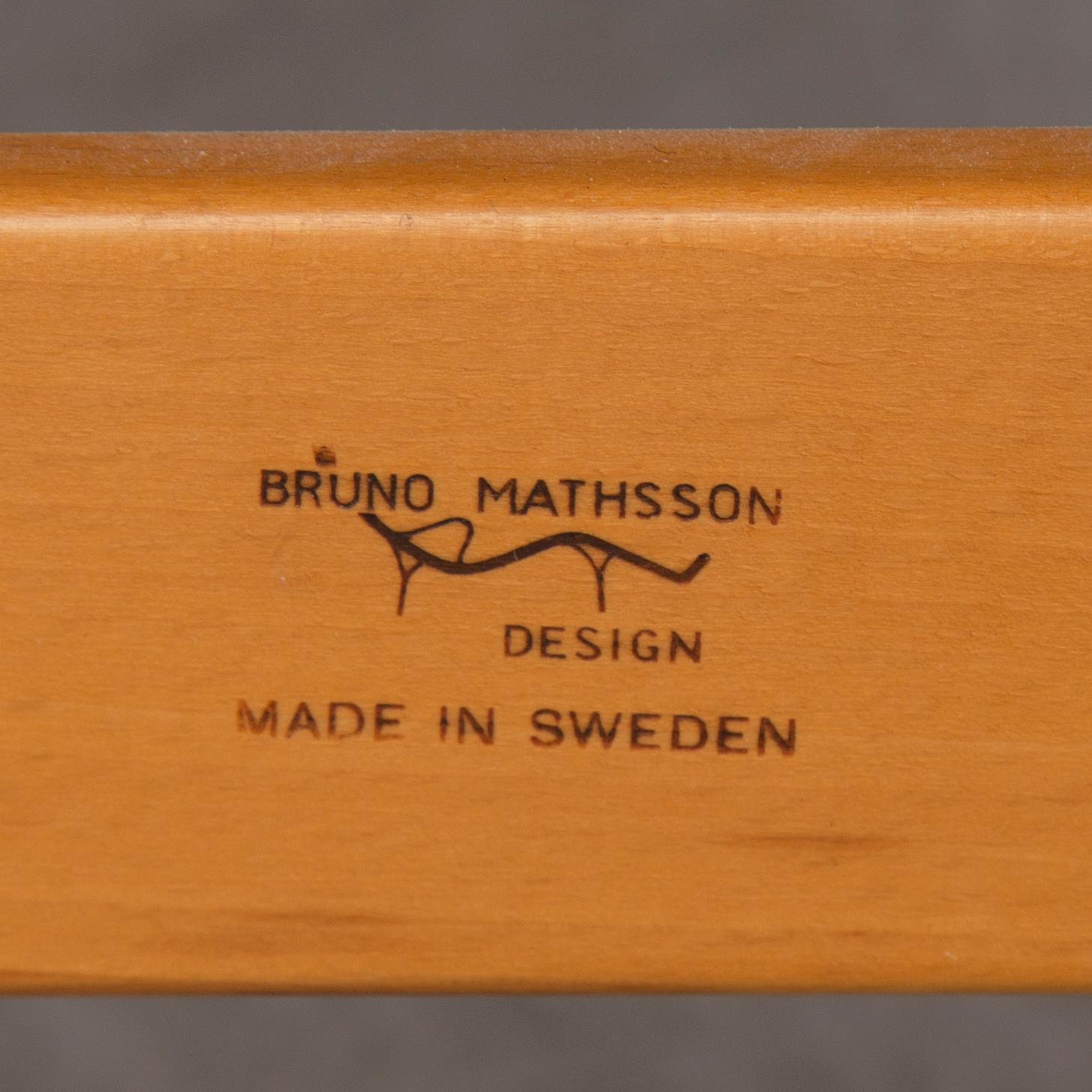 Bruno Mathsson, a 'Pernilla' armchair and a stool, Karl Mathsson, Värnamo, 1950's/60's.