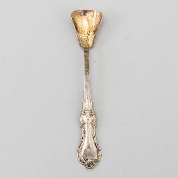 A 19TH CENTURY SILVER SALT CELLAR AND SPOON. Weight ca 45 g.