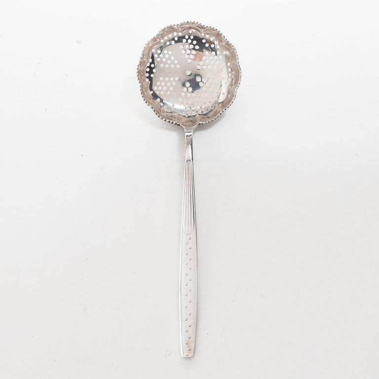 C.G. Hallberg, A Swedish silver sugar bowl with glass insert, mark of CG Hallberg, Stockholm 1896.