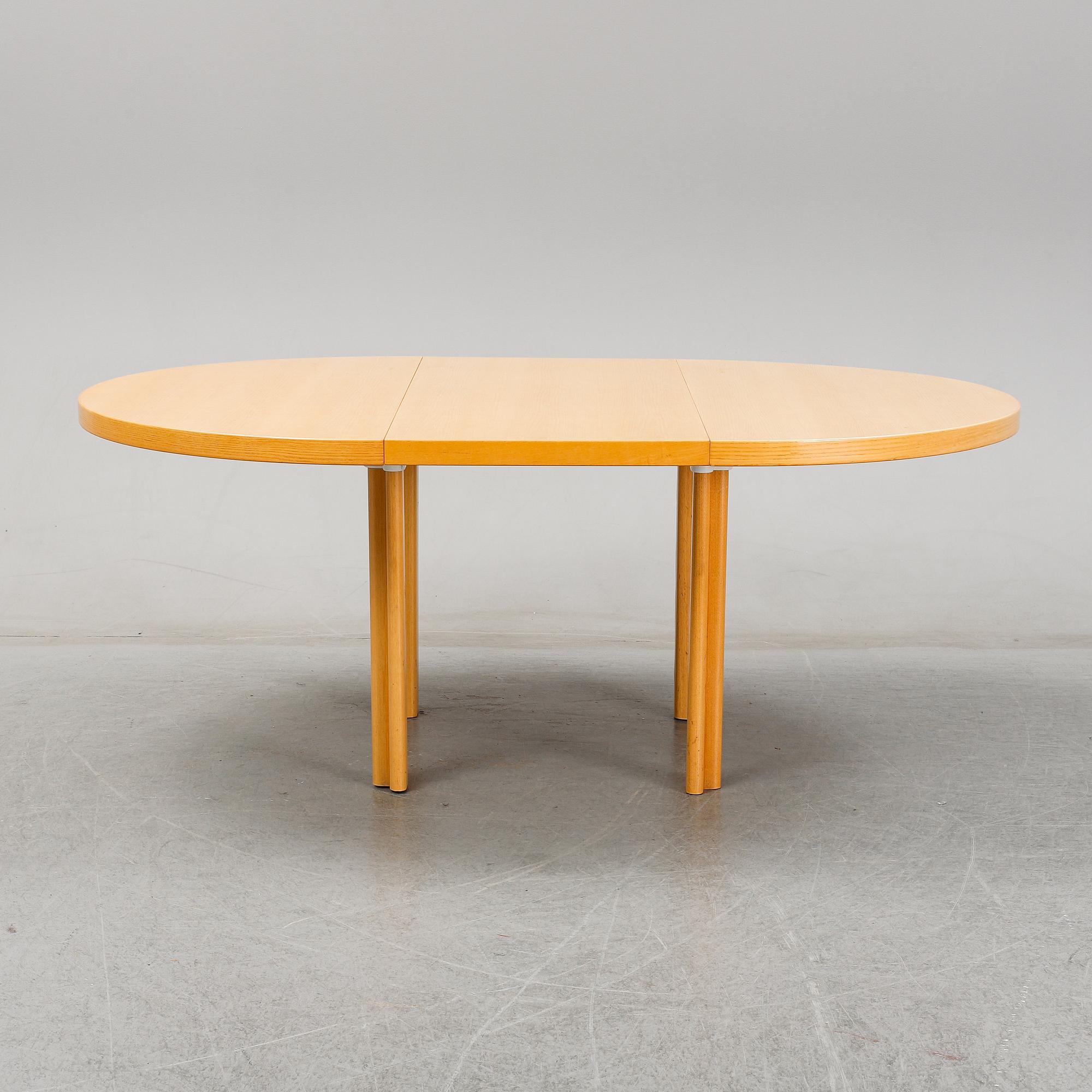 Alvar Aalto, an elm Artek dining table, Finland.