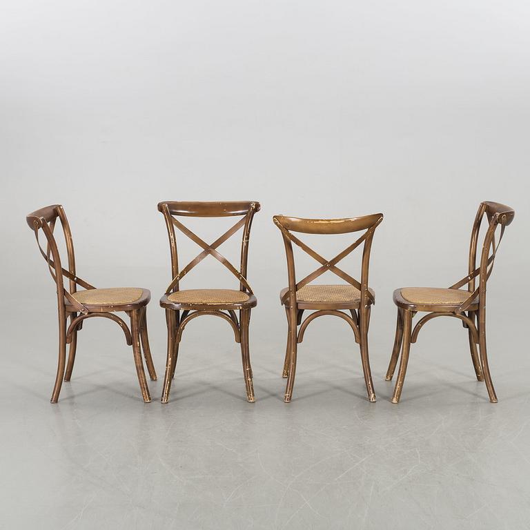 A wooden sofa, a table and four chairs, later part of the 20th century.