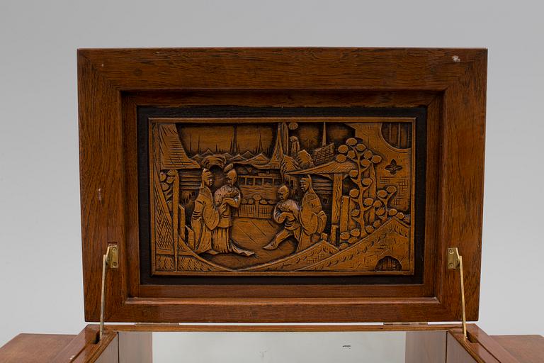 a chinese style bar cabinet from the late 20th century.