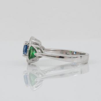 A sapphire, circa 1.30 cts, tsavorite garnet and diamond ring.