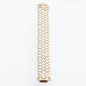 A 14K gold bracelet.