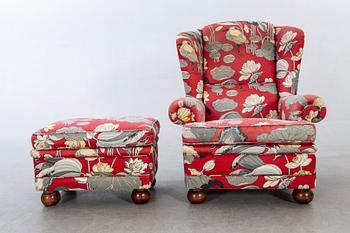 An easy chair with stool later part of the 20th century.