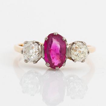 Old cut diamond and ruby three stone ring.