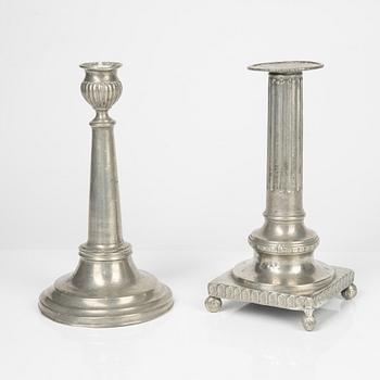 Two pewter candlesticks, 19th Century.