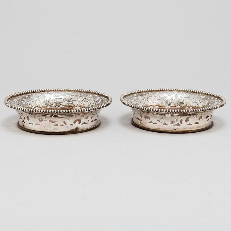 A pair of sterling silver coasters, late 20th Centrury.