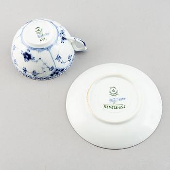 A 92 pcs half lace porcelain dinner-and coffee service, "Musselmalet" from Royal Copenhagen.