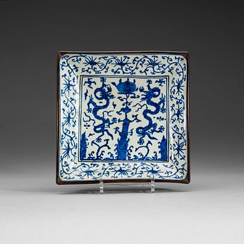 1679. A square blue and white dish, Ming dynasty, Jiajing mark and period (1522-1566).