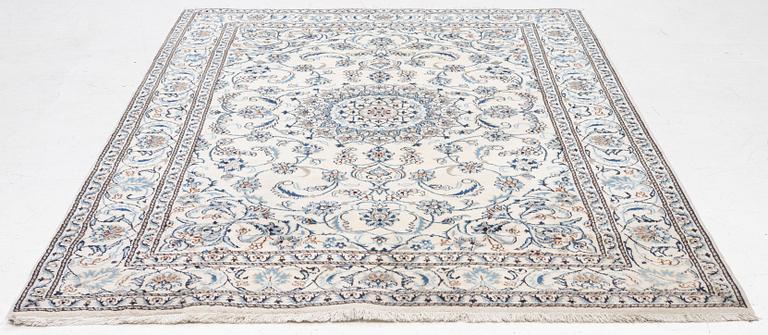 A Nain carpet, c. 275 x 195 cm.