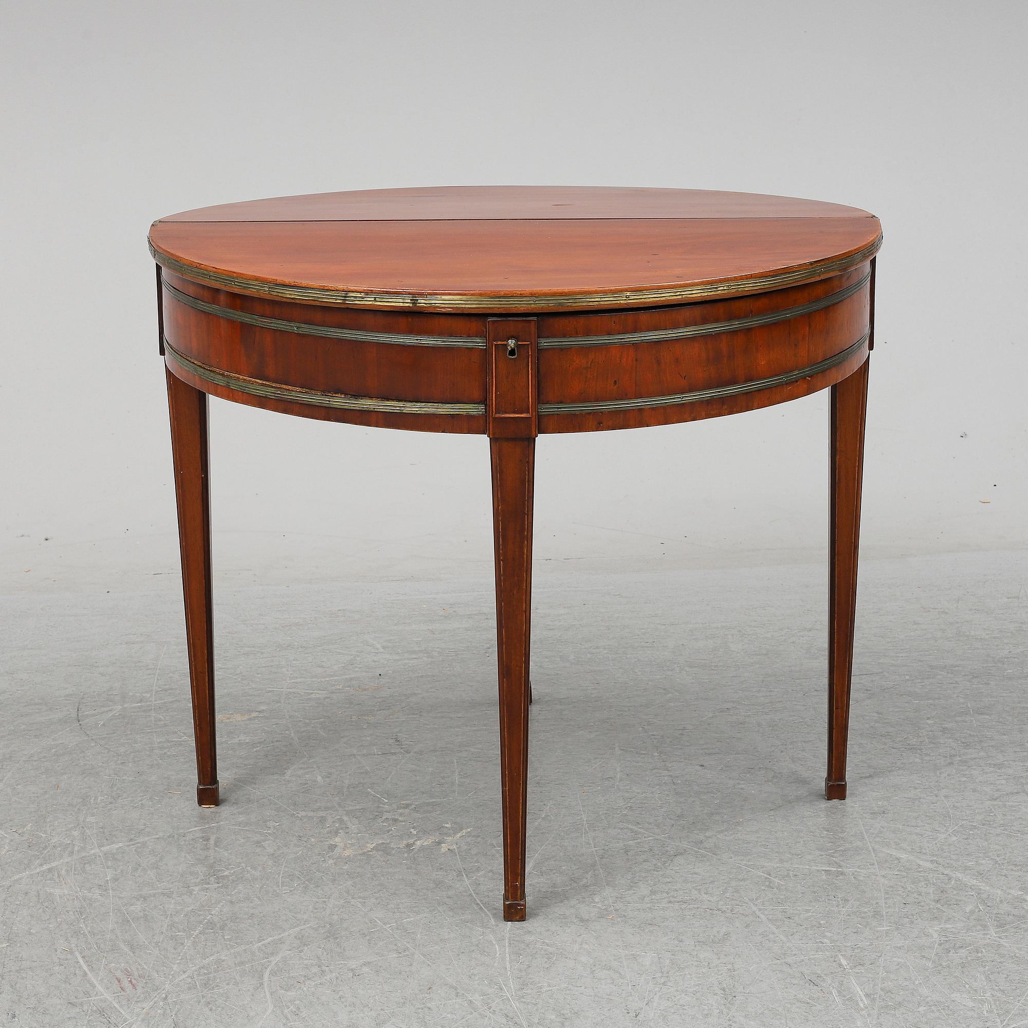 A Directoire games table.