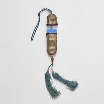 A set of three embroidered purses/ eye-glass cases, Qing dynasty, 19th century.