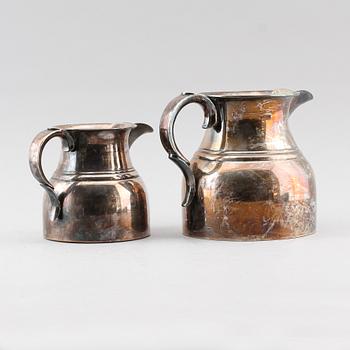 KANNOR, 2 st, nysilver, 1900-talets första hälft.