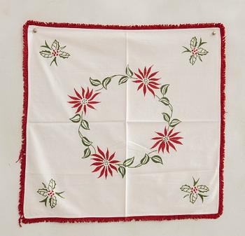 A collection of Christmas tablecloths 12 pcs first half/mid 20th century.