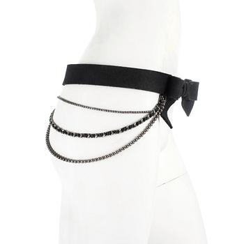 CHANEL, a felt and leather belt.