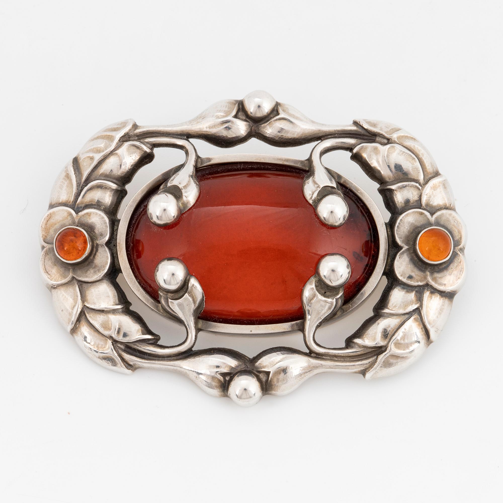 Georg Jensen brosch 169 silver med bärnsten.