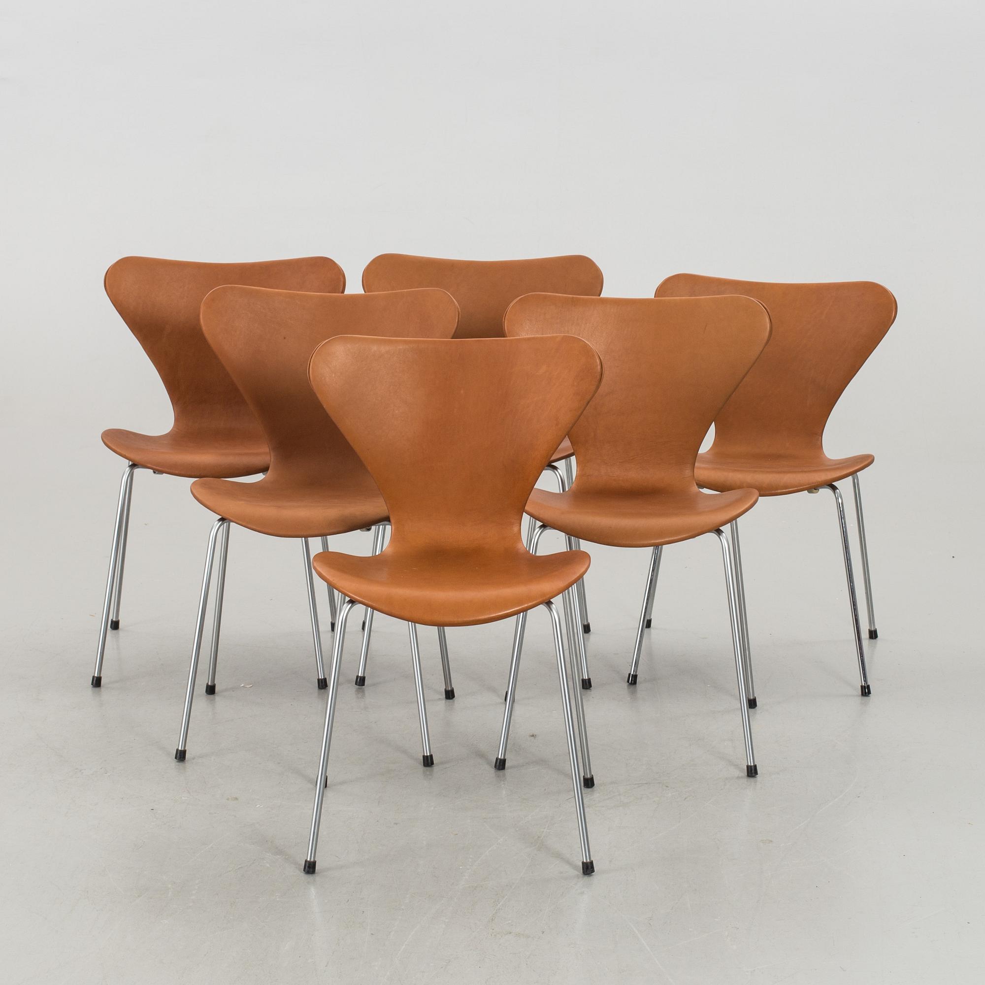 ARNE JACOBSEN, a set of six Sjuan chairs.