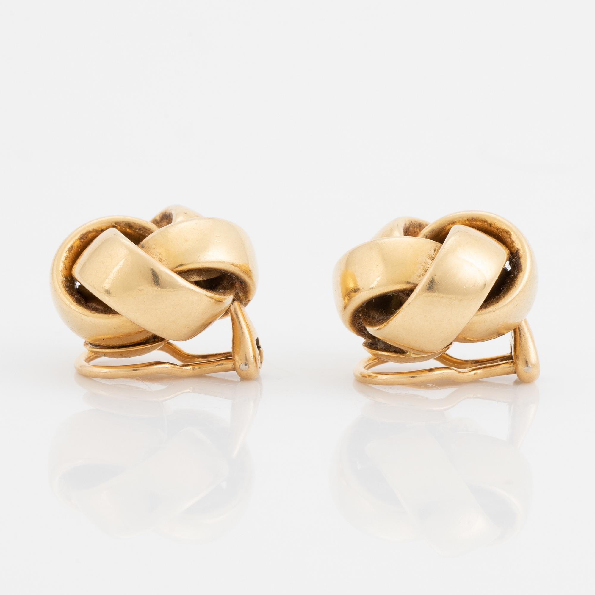 18K gold clip earrings.
