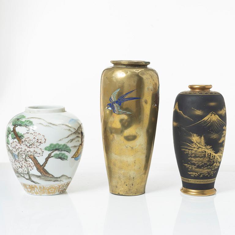 Two Japanese vases and a jar, porcelain and gilt copper, 20th century.