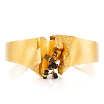 611E. Björn Weckström armring "Ultima thule" 18K guld med turmalinstavar, för Lapponia.