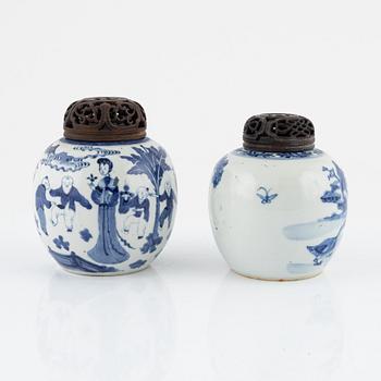 Two similar blue and white lidded urns, China, 19th century.