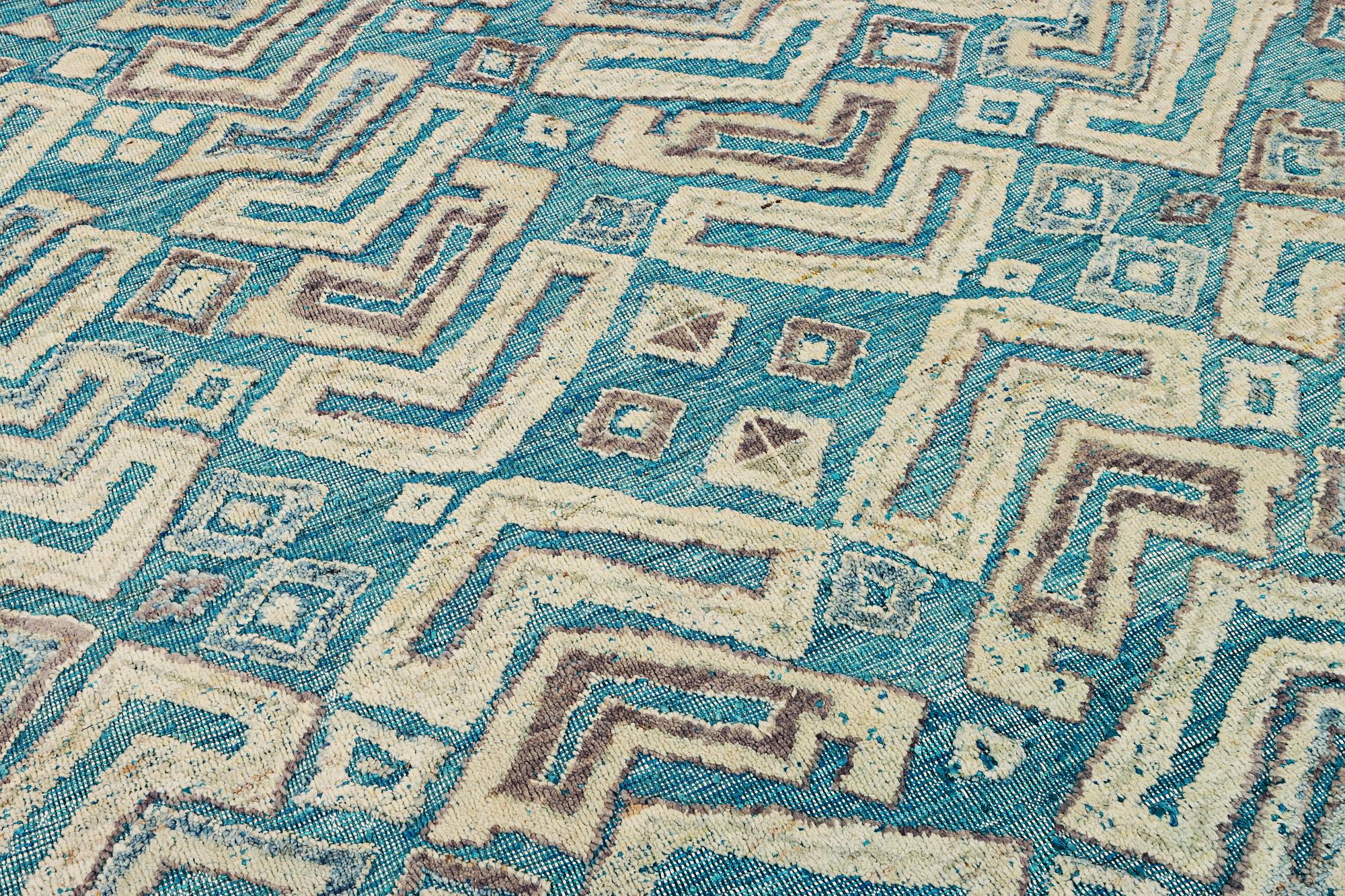 A Moroccan carpet, c. 398 x 200 cm.