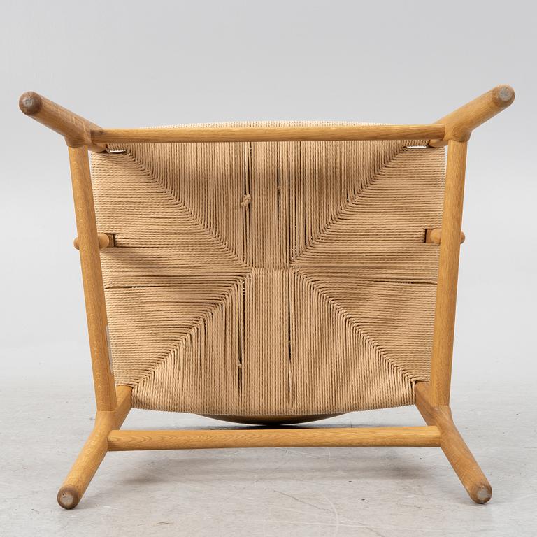 Hans J. Wegner, a CH26 chair, Carl Hansen & Son, Denmark, 21st century.