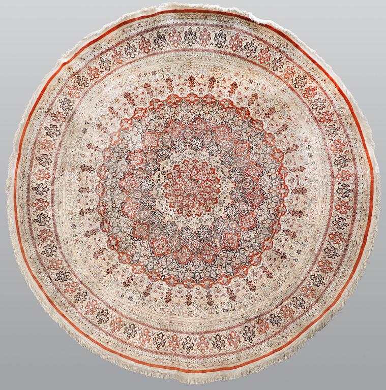 A carpet, Oriental silk, Diameter, 256 cm.