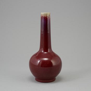 A Chinese copper red glazed bottle vase, presumably late 19th century.