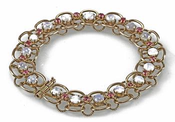 ARMLÄNK, 14 K guld, rubiner samt stenar.