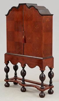 A Carl Malmsten mahogany cabinet, Nordiska Kompaniet, ca 1918.