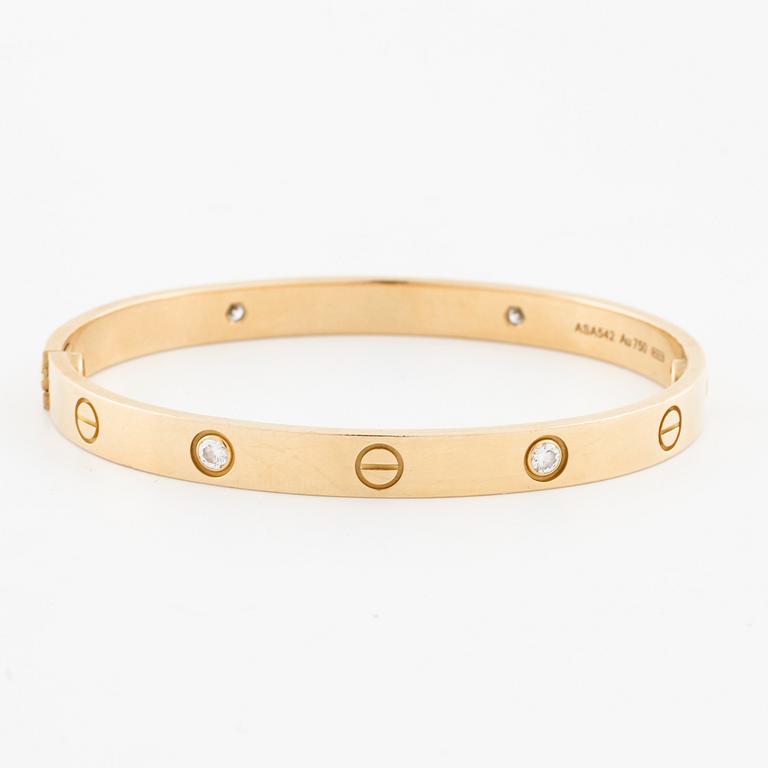 CARTIER, Love bracelet with four brilliant cut diamonds ca 0.40 ct in total.
