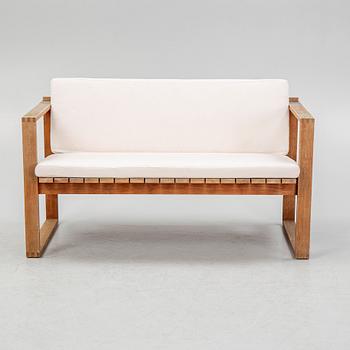 A garden table with sofa and three armchiars, Carl Hansen & Søn, Denmark.