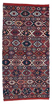 179. A CARPET, AN ANTIQUE AZERI KILIM, probably a Shirvan, ca 250 x 117,5 cm.